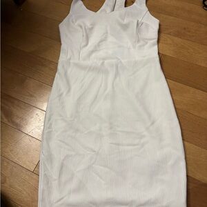 NET textured cream colored dress. Size smalll